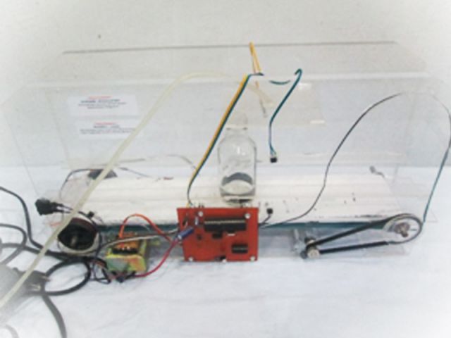 Rancang bangun mesin pengisi botol minuman