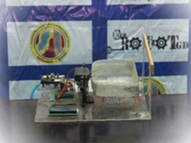 Pengayak tepung otomatis